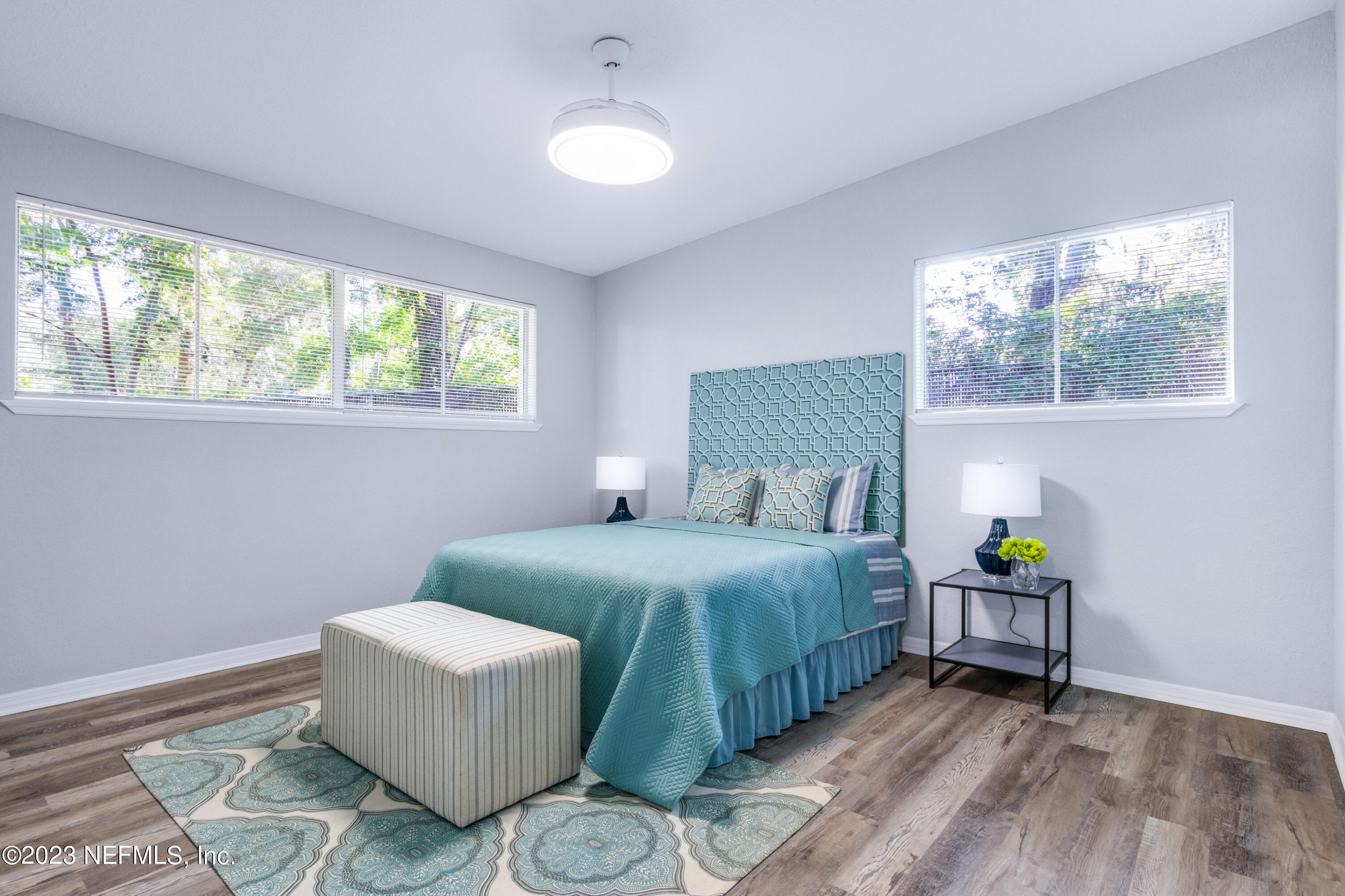 1226 Morgana Road Jacksonville, FL 32211 - Photo 19 of 38 a bedroom with a bed and a large window