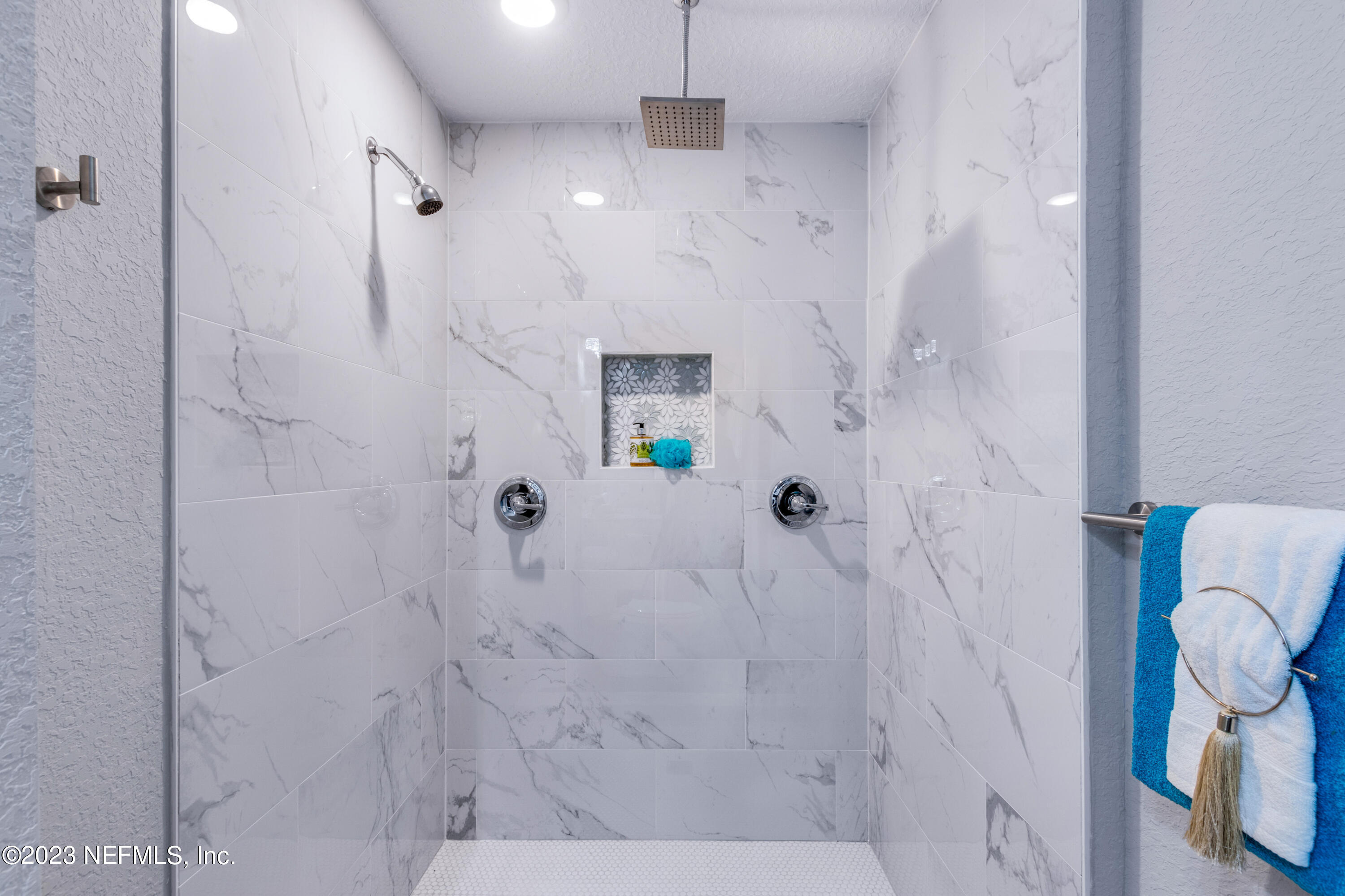 1226 Morgana Road Jacksonville, FL 32211 - Photo 21 of 38 a bathroom with a shower