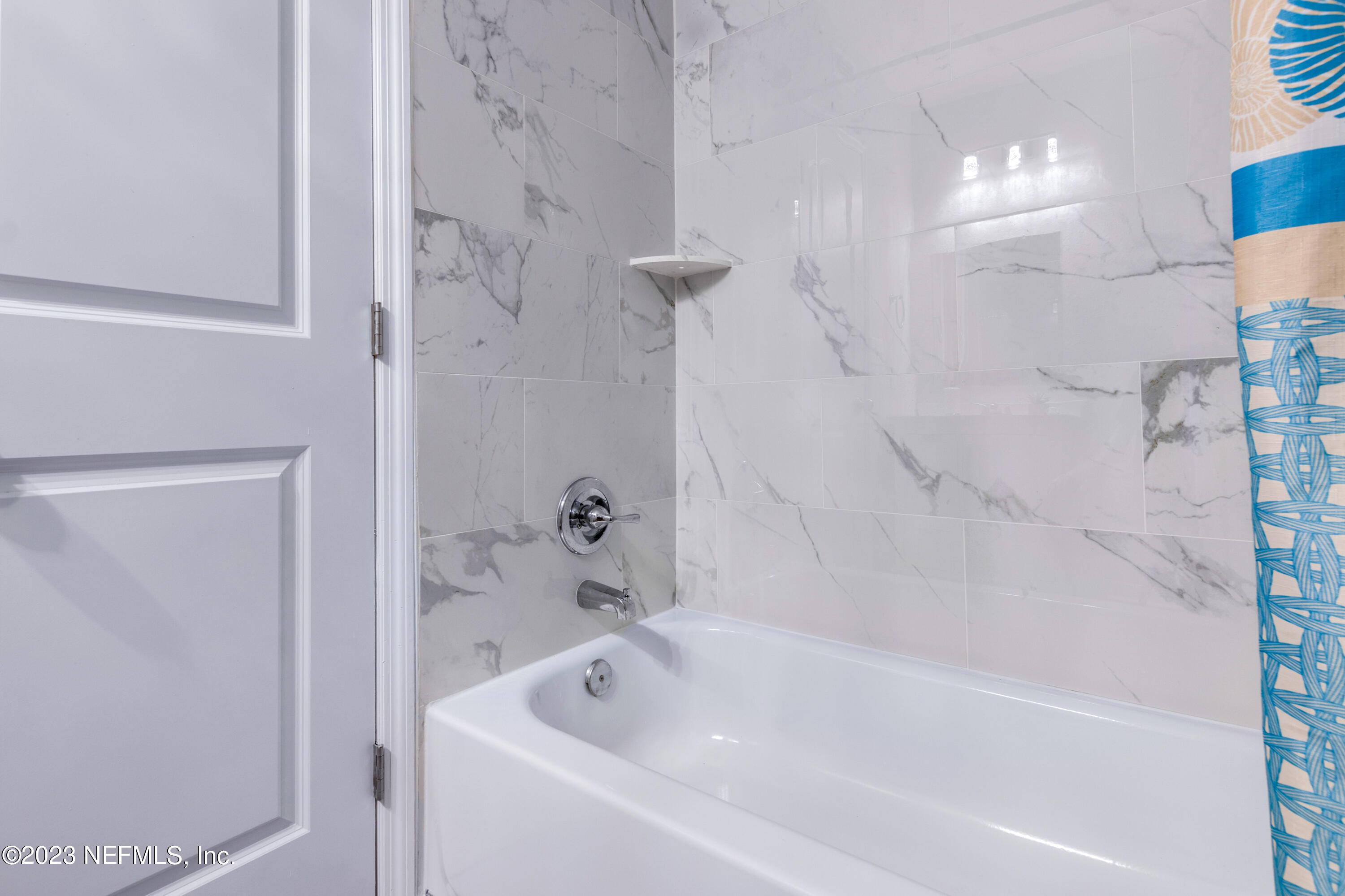 1226 Morgana Road Jacksonville, FL 32211 - Photo 24 of 38 a bathroom with a bathtub
