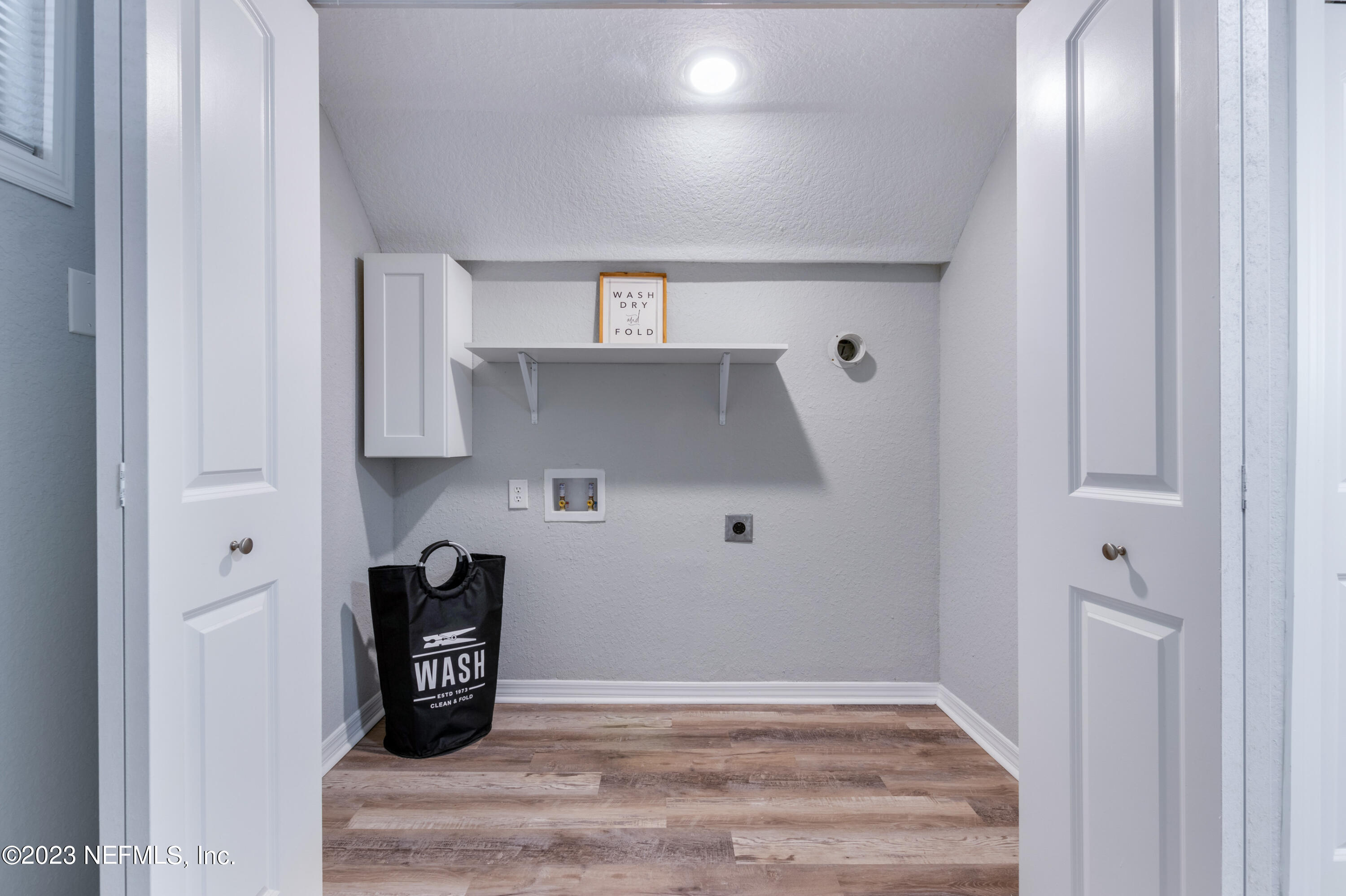 1226 Morgana Road Jacksonville, FL 32211 - Photo 28 of 38 a view of empty room with wooden floor