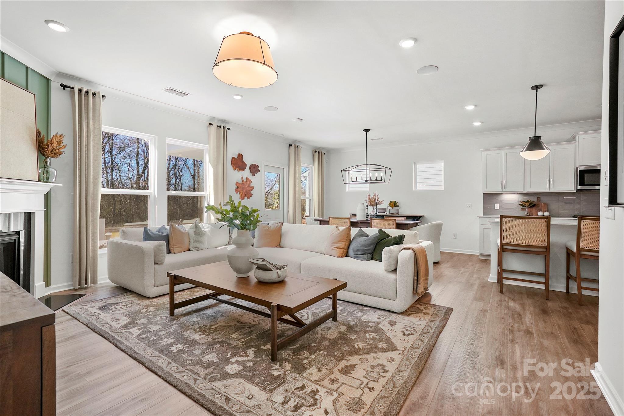 2213 Dickson Court, Unit 52 Monroe, NC 28110 - Photo 20 of 48 a living room with furniture and kitchen view