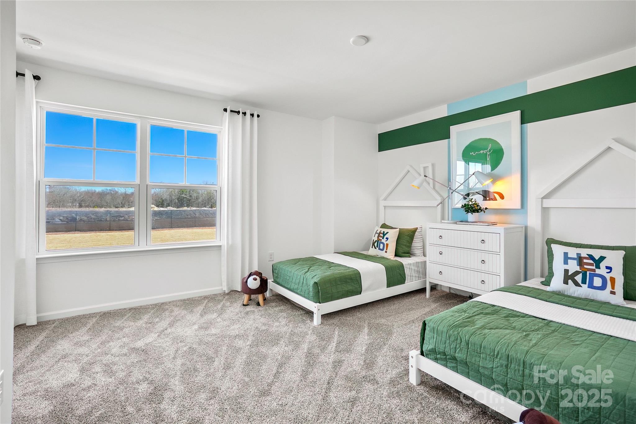 2213 Dickson Court, Unit 52 Monroe, NC 28110 - Photo 32 of 48 a spacious bedroom with a bed and a window