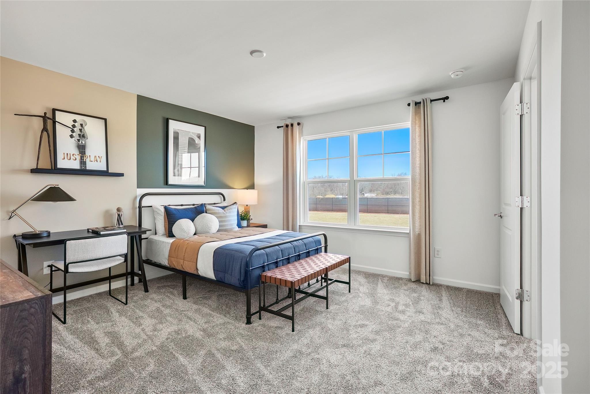 2213 Dickson Court, Unit 52 Monroe, NC 28110 - Photo 34 of 48 a living room with furniture and a window