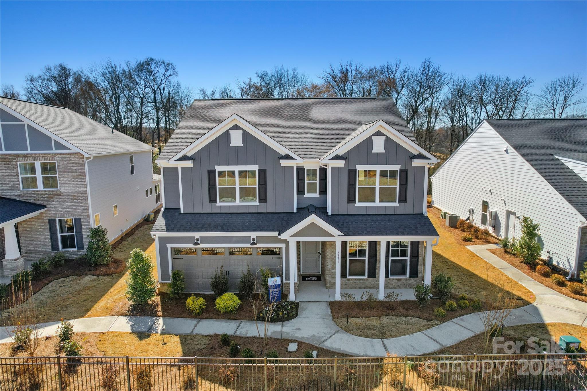 2213 Dickson Court, Unit 52 Monroe, NC 28110 - Photo 5 of 48 a front view of a house with garden
