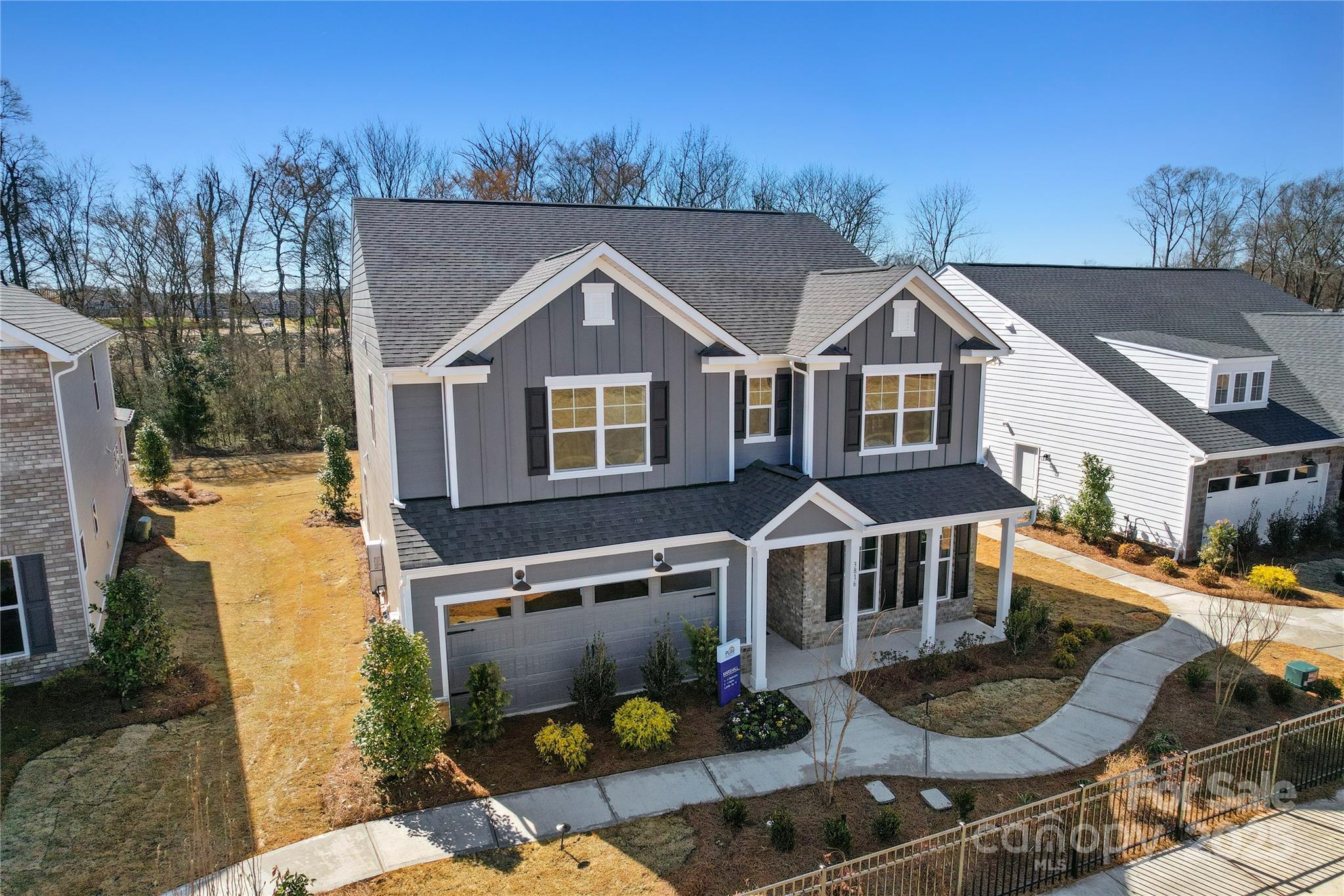 2213 Dickson Court, Unit 52 Monroe, NC 28110 - Photo 7 of 48 a front view of a house with garden