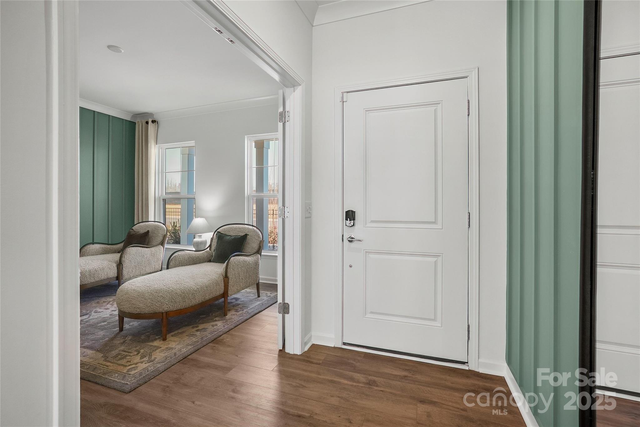 2213 Dickson Court, Unit 52 Monroe, NC 28110 - Photo 10 of 48 a living room with furniture and a wooden floor
