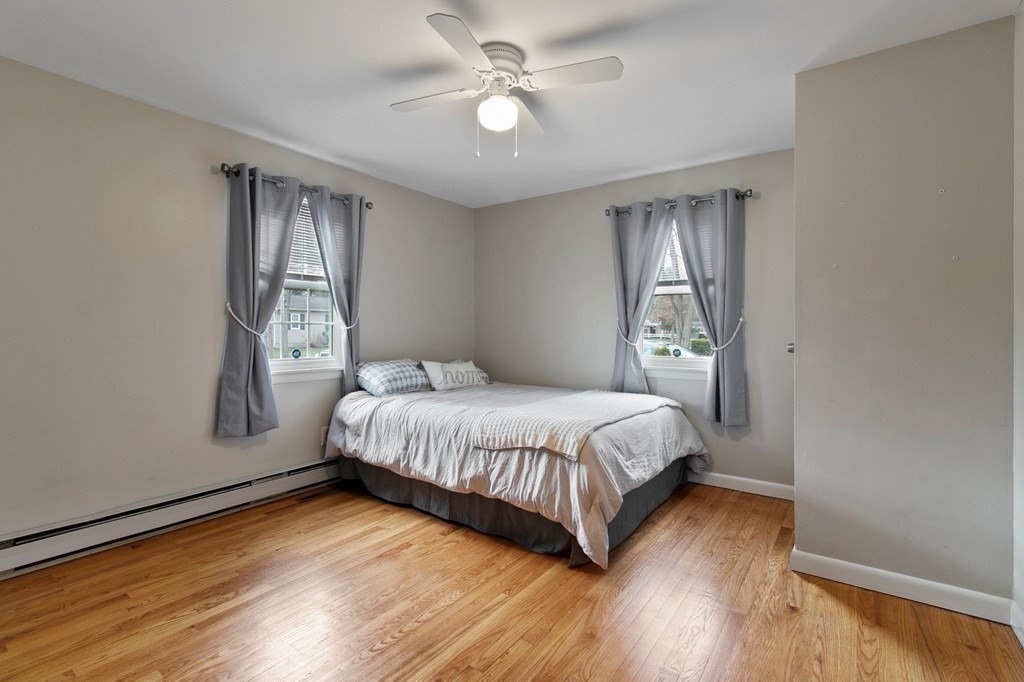 52 Portulaca Drive Springfield, MA 01129 - Photo 17 of 36 a bedroom with a bed and window