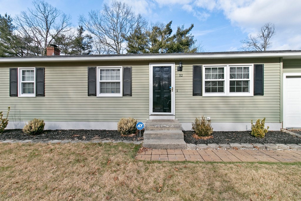 52 Portulaca Drive Springfield, MA 01129 - Photo 2 of 36 a view of a back yard of the house