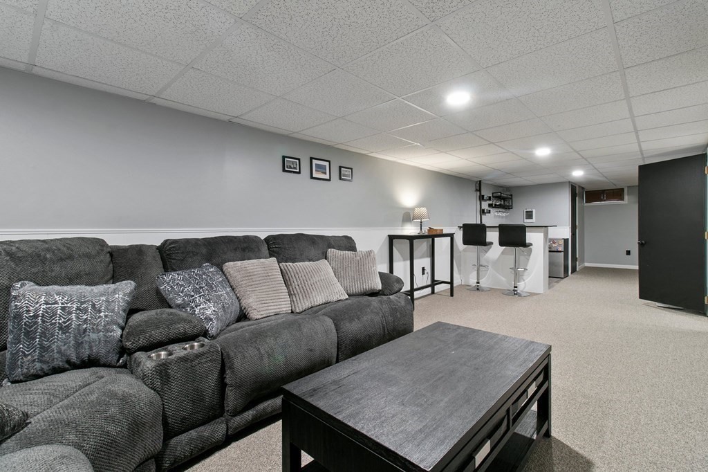 52 Portulaca Drive Springfield, MA 01129 - Photo 23 of 36 a living room with furniture and kitchen view
