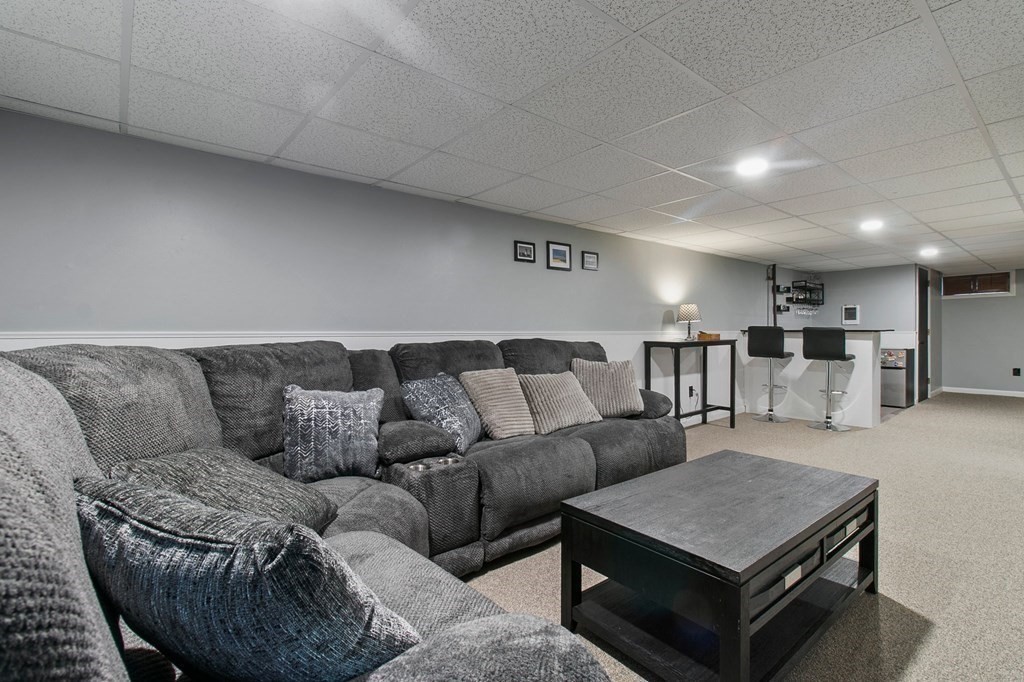 52 Portulaca Drive Springfield, MA 01129 - Photo 24 of 36 a living room with furniture and kitchen view