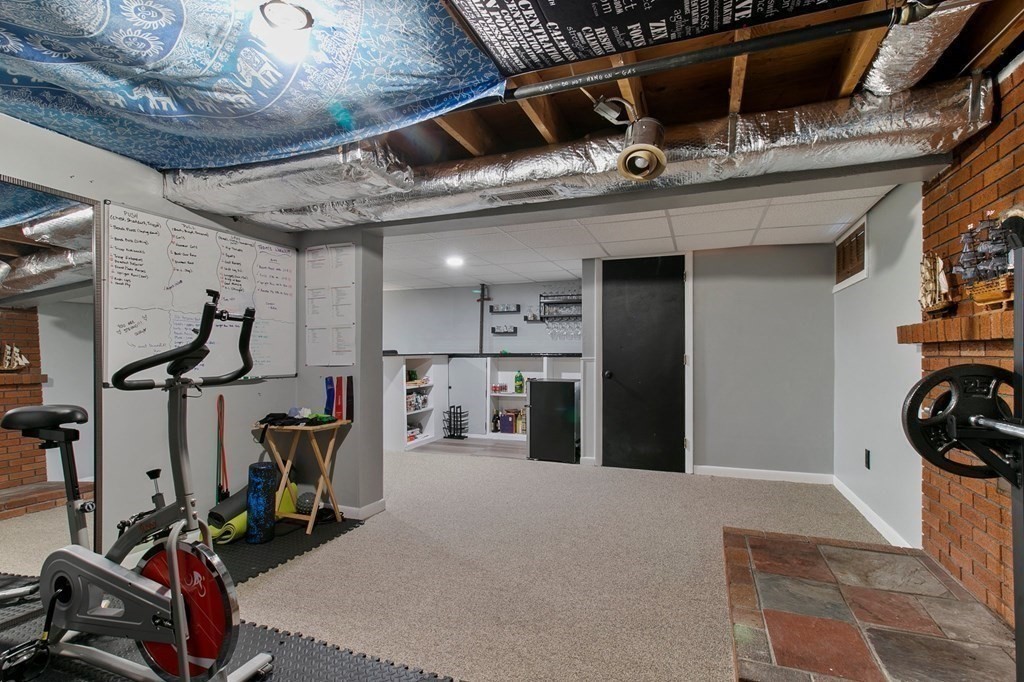 52 Portulaca Drive Springfield, MA 01129 - Photo 28 of 36 a view of a room with gym equipment