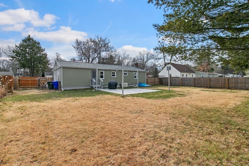 52 Portulaca Drive Springfield, MA 01129 - Photo 33 of 36 a view of a house with a yard