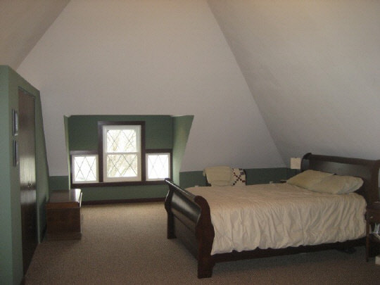 804 8th Street Rochelle, IL 61068 - Photo 5 of 6 a bedroom with a bed and window