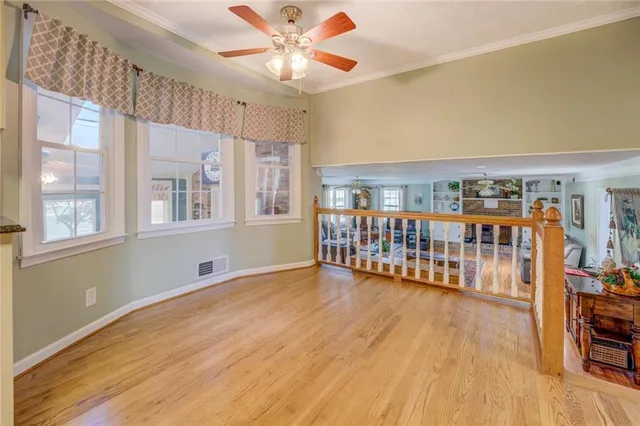 a living room with furniture rug and window