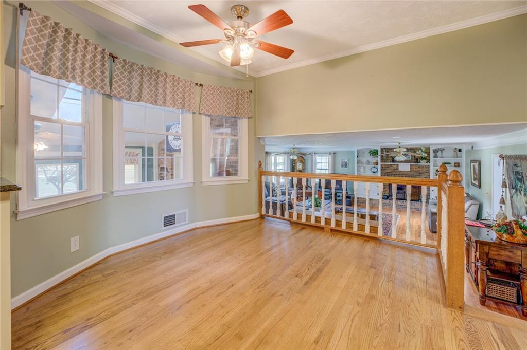 740 Smyrna Road Southwest Conyers, GA 30094 - Photo 14 of 50 a view of a livingroom with hardwood and furniture