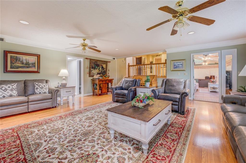 740 Smyrna Road Southwest Conyers, GA 30094 - Photo 16 of 50 a living room with furniture and a rug
