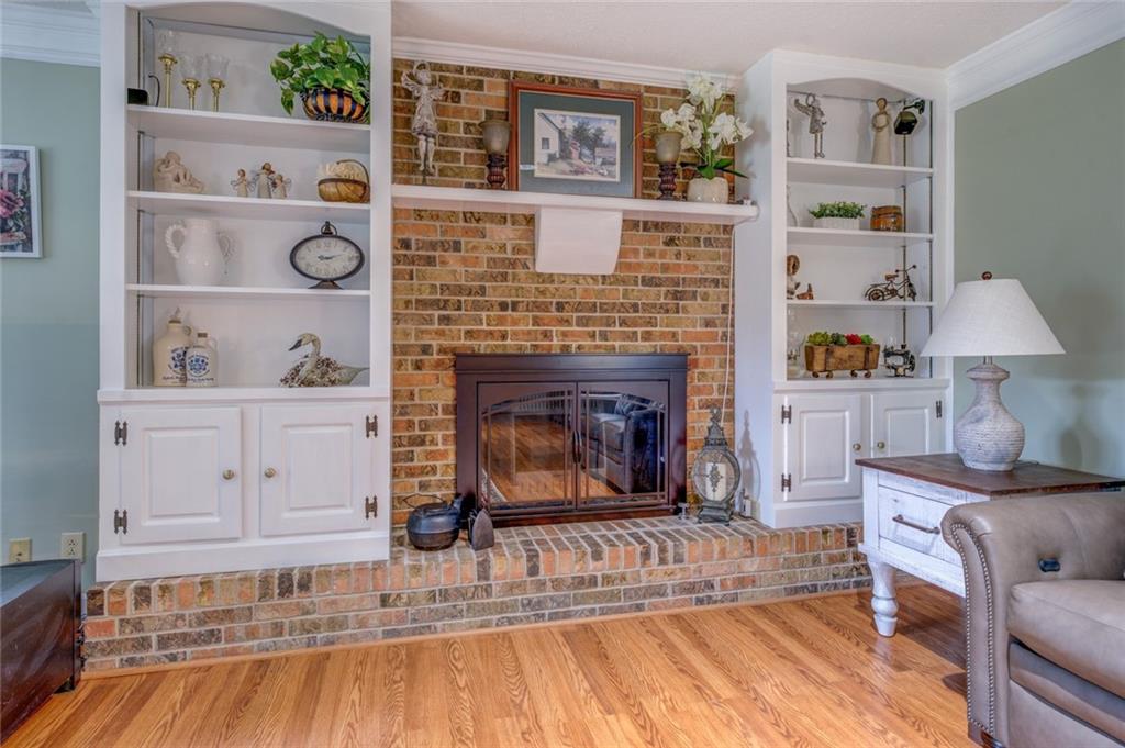 740 Smyrna Road Southwest Conyers, GA 30094 - Photo 18 of 50 a living room with furniture and a fireplace