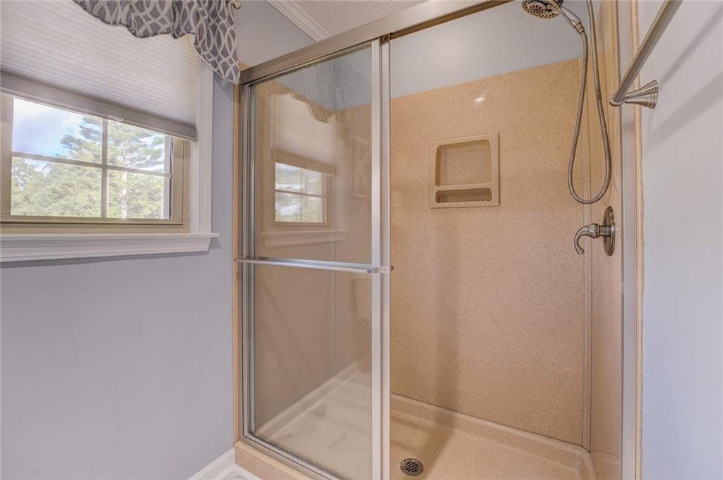740 Smyrna Road Southwest Conyers, GA 30094 - Photo 30 of 50 a bathroom with a shower