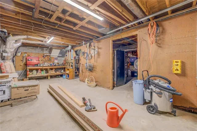 a view of a house with swimming pool and garden