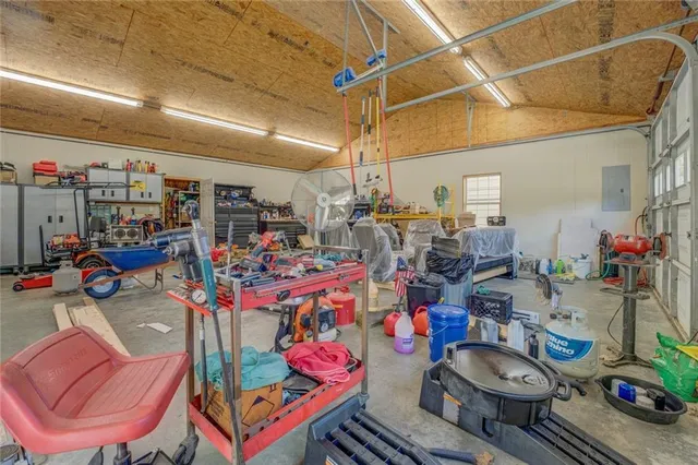 a house with swimming pool in front of it