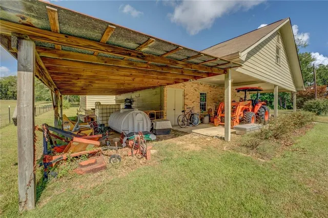 a view of a field with trees