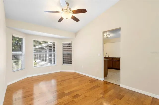 a view of an empty room with a window