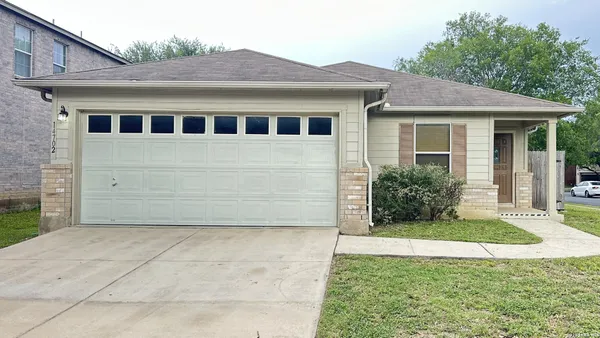 a front view of house with yard