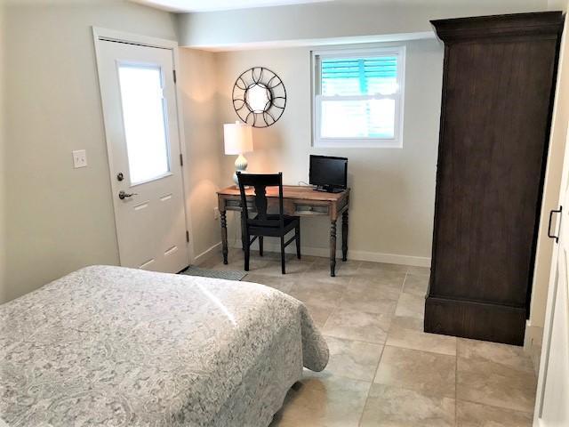 244 Hilltop Drive Santa Rosa Beach, FL 32459 - Photo 14 of 20 a bed room with a bed and a window