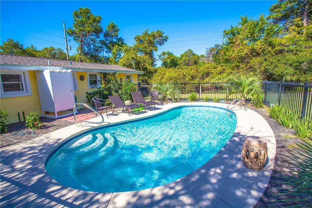 244 Hilltop Drive Santa Rosa Beach, FL 32459 - Photo 19 of 20 a view of a swimming pool with a patio