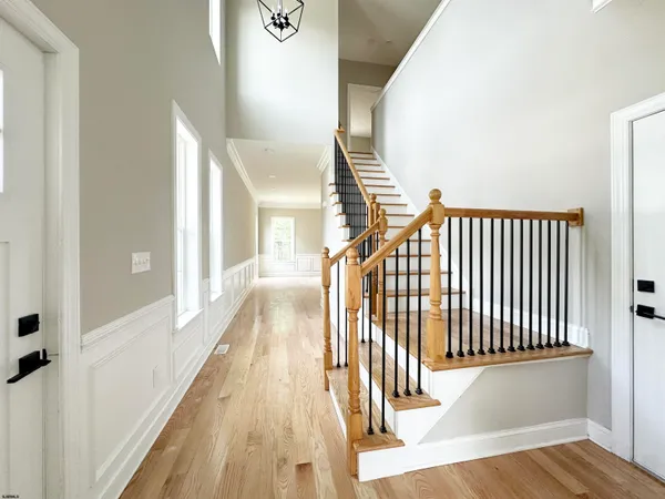 a kitchen with a stove a sink and a refrigerator