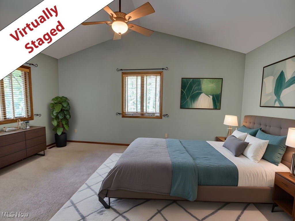 6822 Ryan Road Medina, OH 44256 - Photo 8 of 50 Bedroom featuring vaulted ceiling, light colored carpet, and ceiling fan