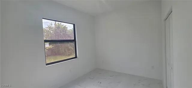 an empty room with cabinet