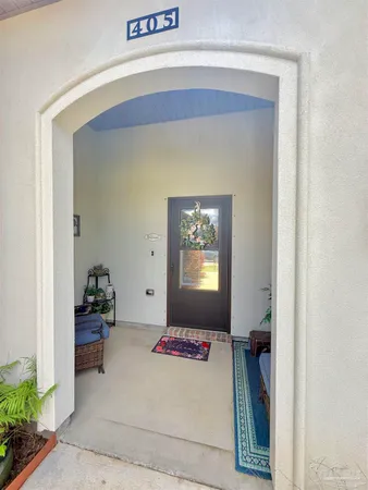 a view of a door and bedroom