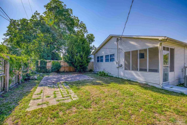 a view of a house with swimming pool