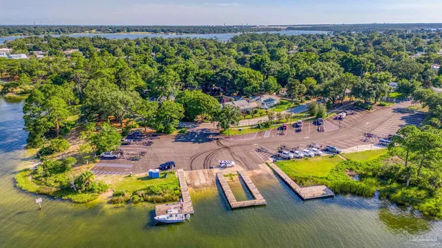 a view of a swimming pool with a yard