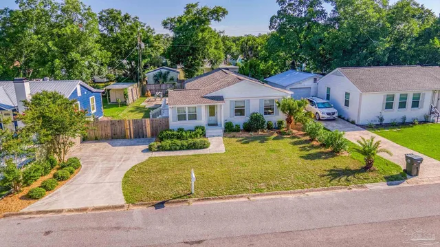 front view of a house with a yard