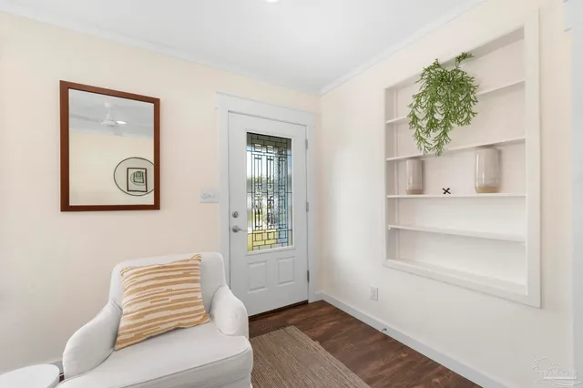 a view of room with window and bathroom