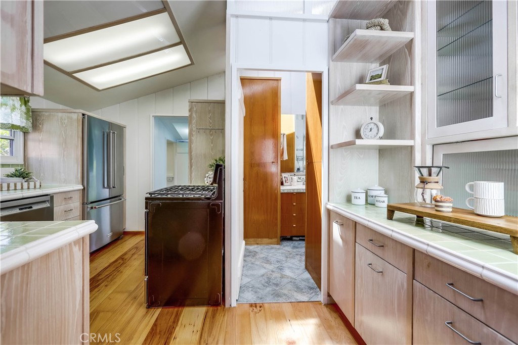 464 Agate Street, Unit A/B Laguna Beach, CA 92651 - Photo 47 of 75 a kitchen with a refrigerator and a sink