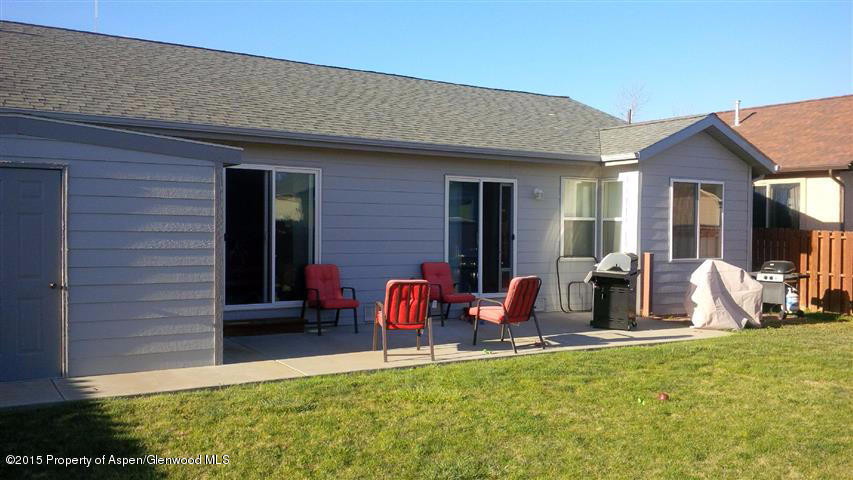 1067 East 18th Street Rifle, CO 81650 - Photo 2 of 14 a front view of house with outdoor seating