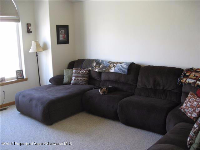 1067 East 18th Street Rifle, CO 81650 - Photo 7 of 14 a living room with furniture