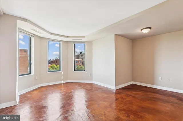 an empty room with windows