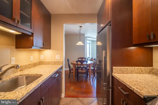 a bathroom with a shower and toilet