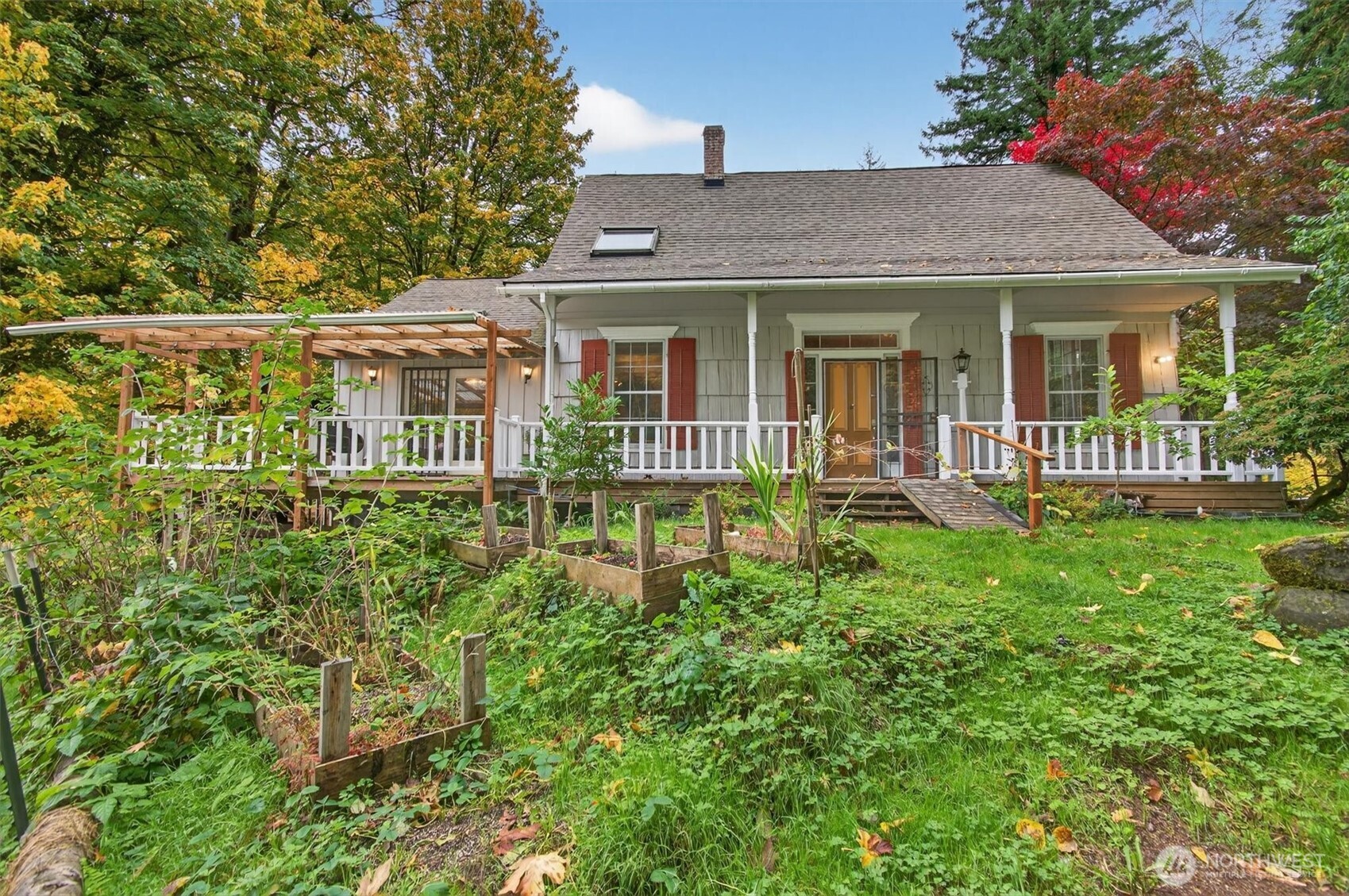 1015 Hazel Dell Road Castle Rock, WA 98611 - Photo 1 of 35 a front view of a house with a yard