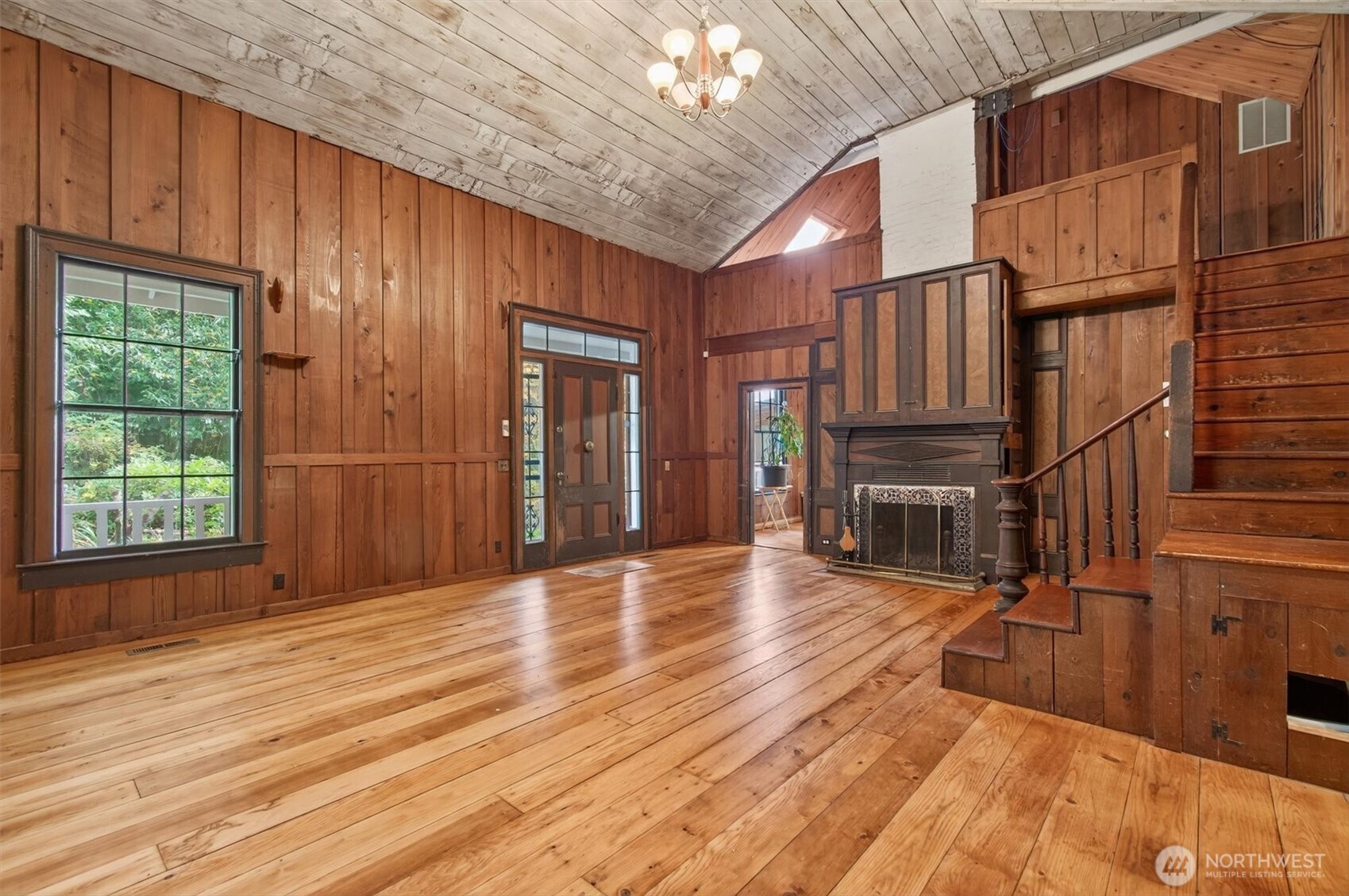 1015 Hazel Dell Road Castle Rock, WA 98611 - Photo 13 of 35 a view of empty room with wooden floor and fan