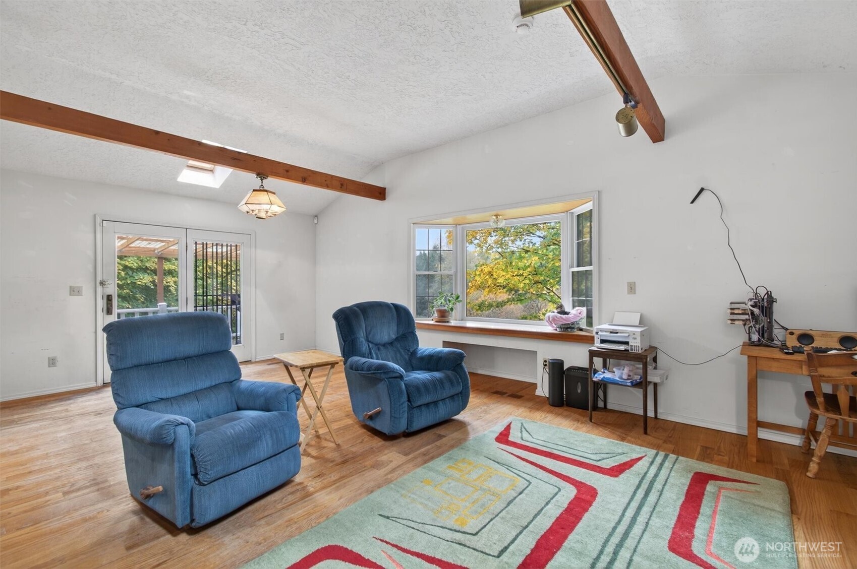 1015 Hazel Dell Road Castle Rock, WA 98611 - Photo 21 of 35 a living room with furniture and a rug