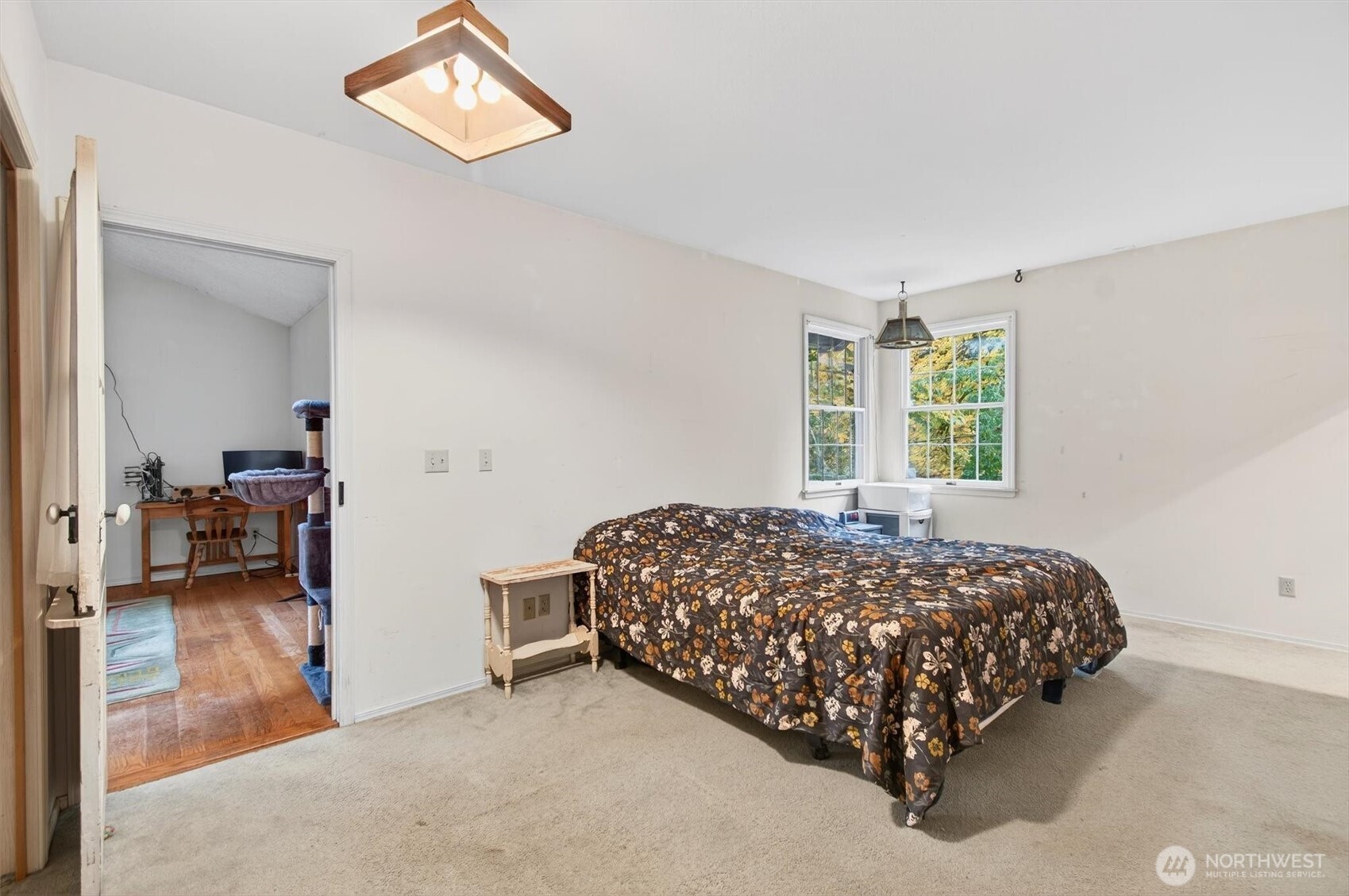 1015 Hazel Dell Road Castle Rock, WA 98611 - Photo 24 of 35 a bedroom with a bed and a walk in closet