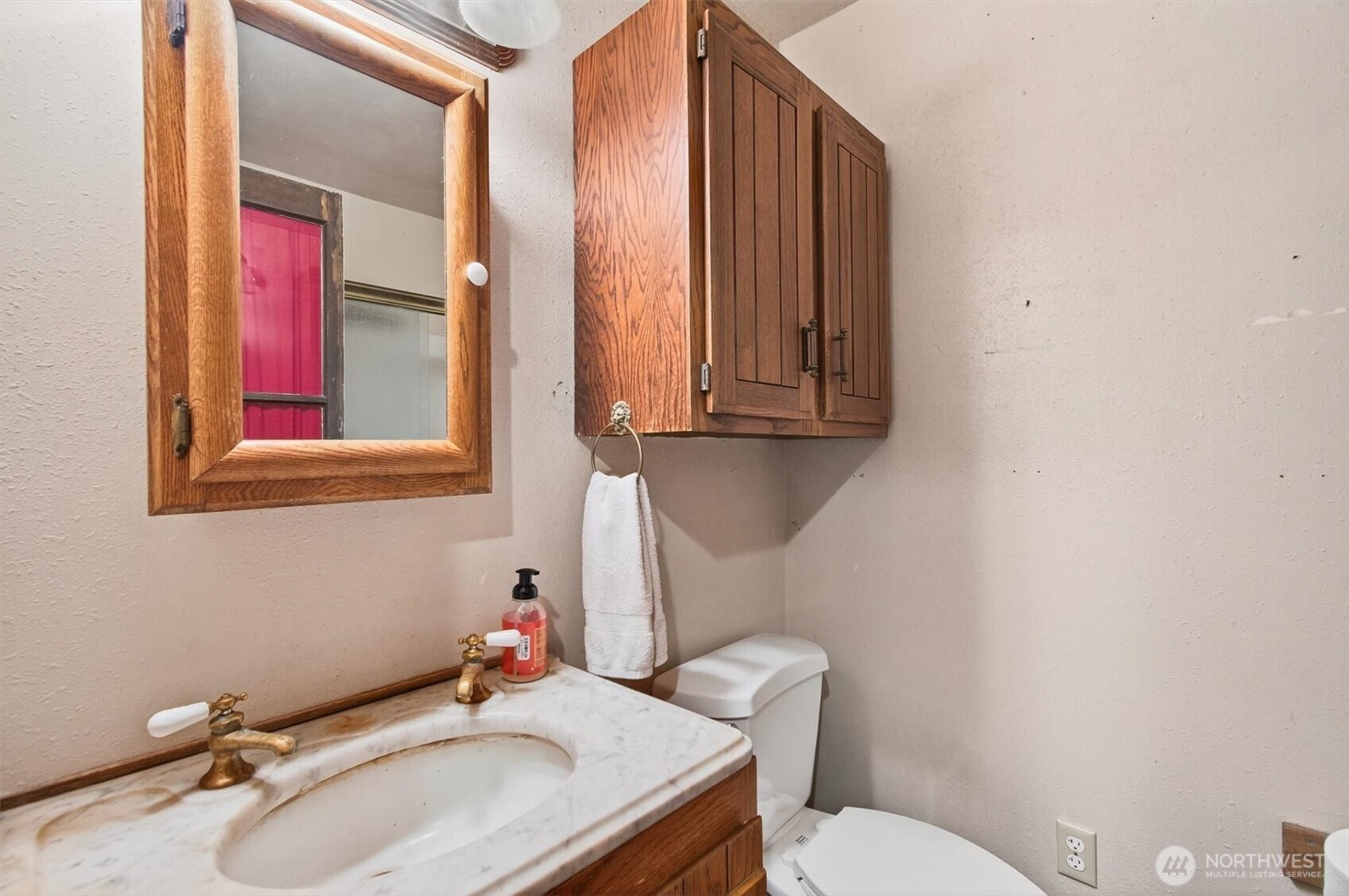 1015 Hazel Dell Road Castle Rock, WA 98611 - Photo 26 of 35 a bathroom with a sink toilet and mirror