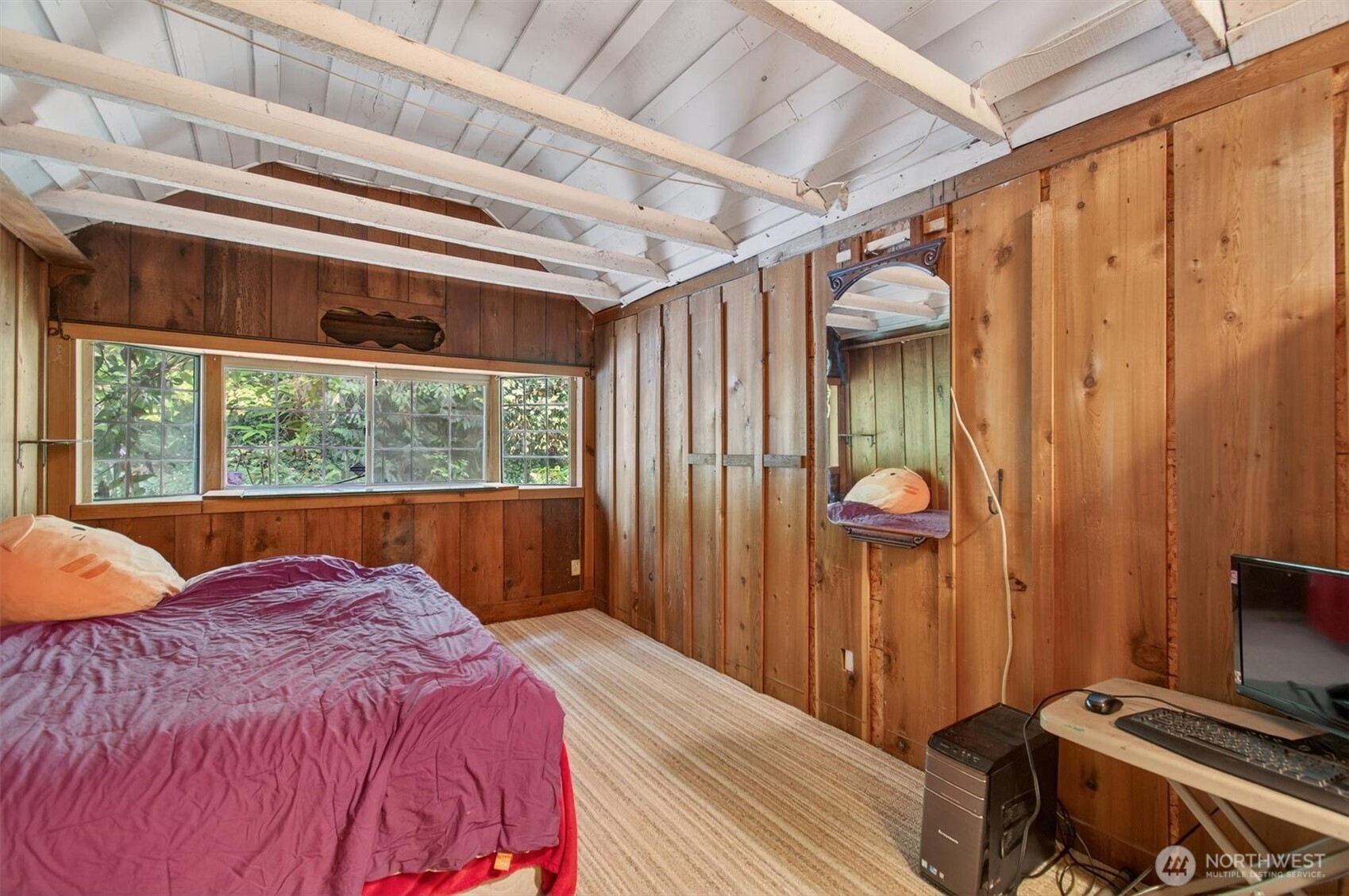 1015 Hazel Dell Road Castle Rock, WA 98611 - Photo 27 of 35 a bed room with a bed and a window