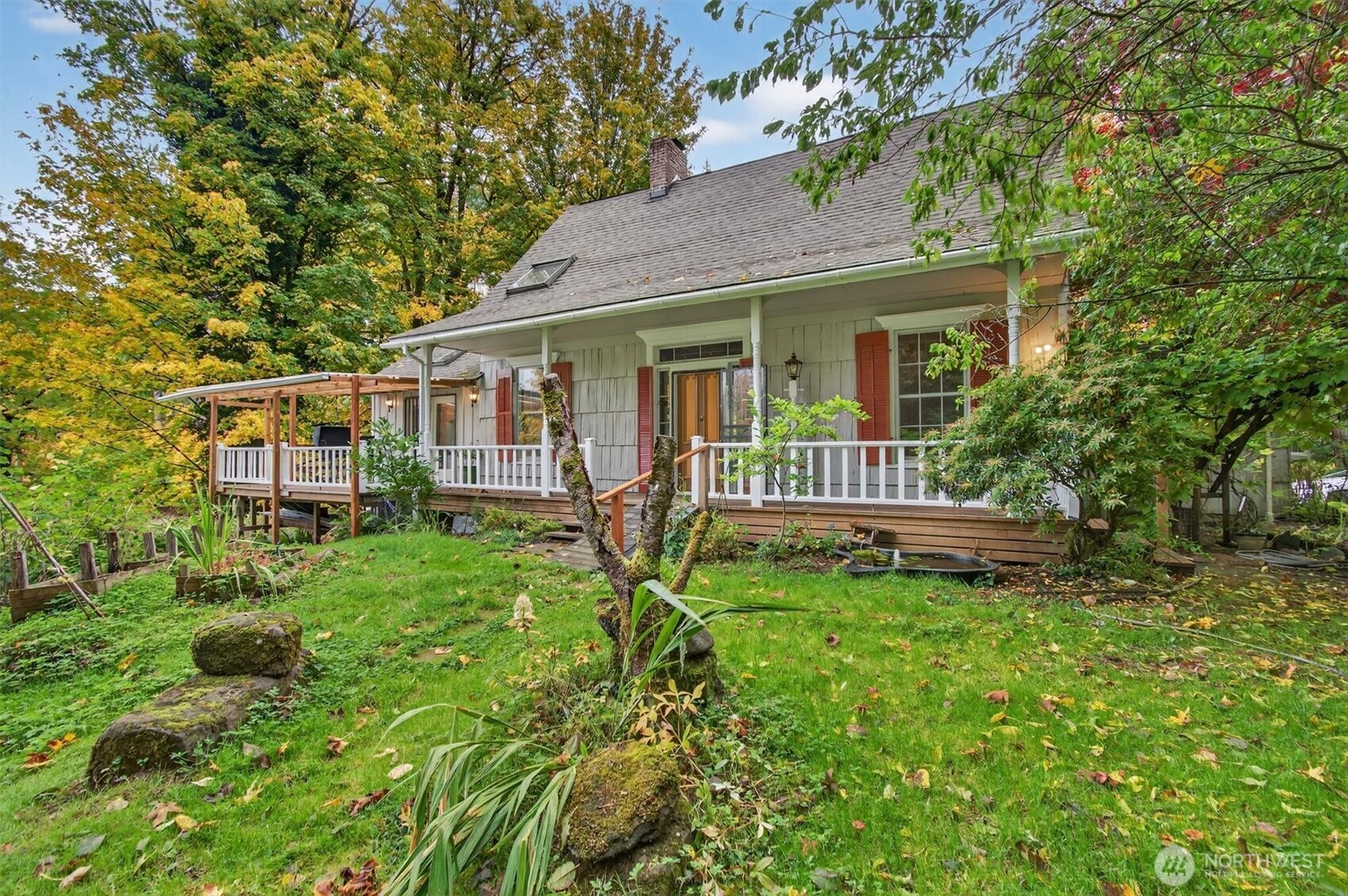 1015 Hazel Dell Road Castle Rock, WA 98611 - Photo 5 of 35 a view of a house with a yard and sitting area
