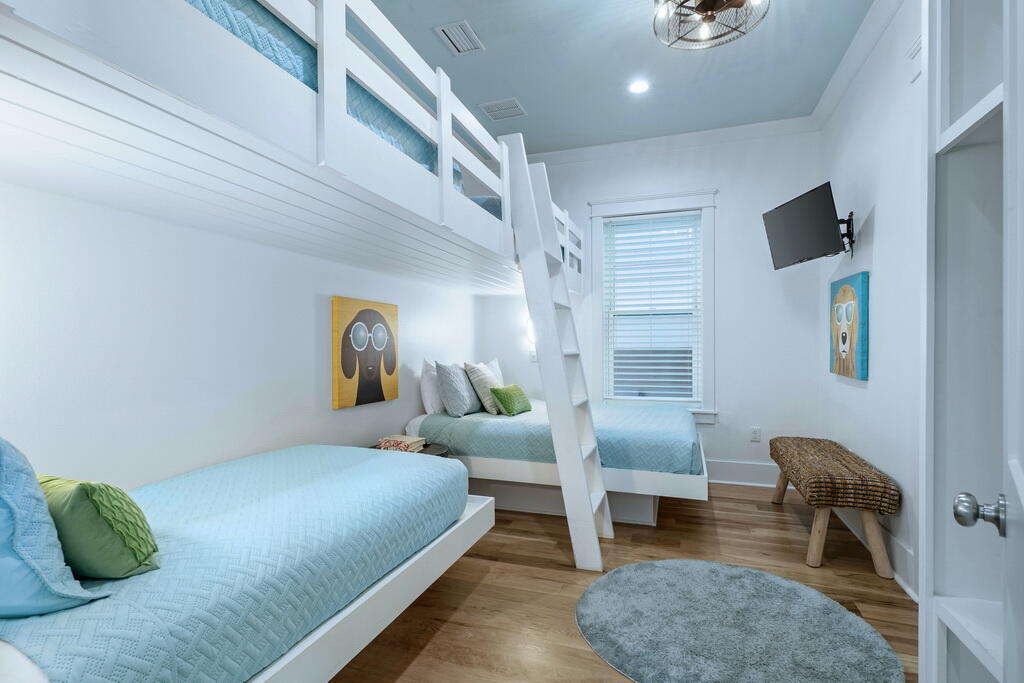 20405 Front Beach Road Panama City Beach, FL 32413 - Photo 37 of 130 a bedroom with a bed window and walk in closet